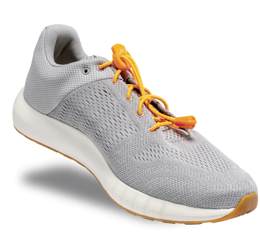 Lock Laces - No Tie Shoelaces in orange on grey sneaker by Lock Laces with double eyelet lock, easy install, one size fits all accessory for running store use