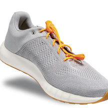 Lock Laces - No Tie Shoelaces in orange on grey sneaker by Lock Laces with double eyelet lock, easy install, one size fits all accessory for running store use