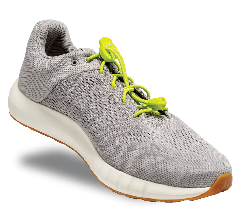 Lock Laces - No Tie Shoelaces in lime green on grey shoe with double eyelet lock for easy installation and secure fit, ideal for running store use