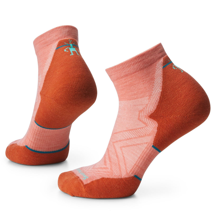 Run Targeted Cushion Ankle Socks - Women by SmartWool in pink and orange with cushioned support, ideal for running and training miles